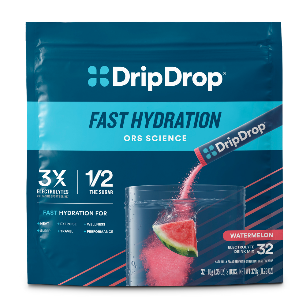 DripDrop Fast Hydration watermelon electrolyte drink mix in a pouch. The packaging is dark blue with bright cyan and white text, and a graphic shows a glass of pink drink with a watermelon slice being poured from the pouch.