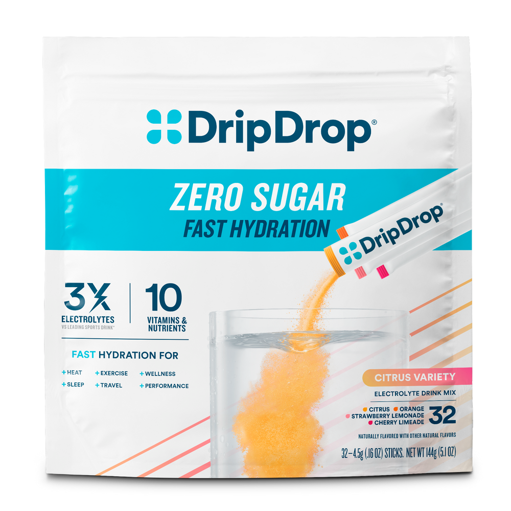 A package of DripDrop Zero Sugar Fast Hydration electrolyte drink mix in Citrus Variety. The white stand-up pouch features the DripDrop logo in blue, with a graphic of orange powder dissolving in water and a single sachet shown on the right.
