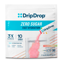 A package of DripDrop Zero Sugar Fast Hydration Classic Variety electrolyte drink mix. The white stand-up pouch features the blue DripDrop logo, text indicating 3x electrolytes and 10 vitamins, and a graphic of pink powder being poured into a glass of water.