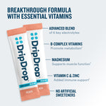 Two DripDrop Plus+ peach flavor sachets shown on a light background with marketing text highlighting electrolytes, B-complex vitamins, magnesium, vitamin C and zinc, and no artificial sweeteners.