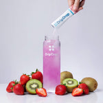 A hand pours DripDrop powder from a white sachet into a clear bottle filled with pink liquid, surrounded by fresh strawberries, kiwi slices, and whole kiwi on a light gray background.